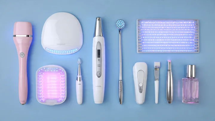 Modern skincare tools for anti-aging treatments including LED light therapy, facial rollers, and serums.